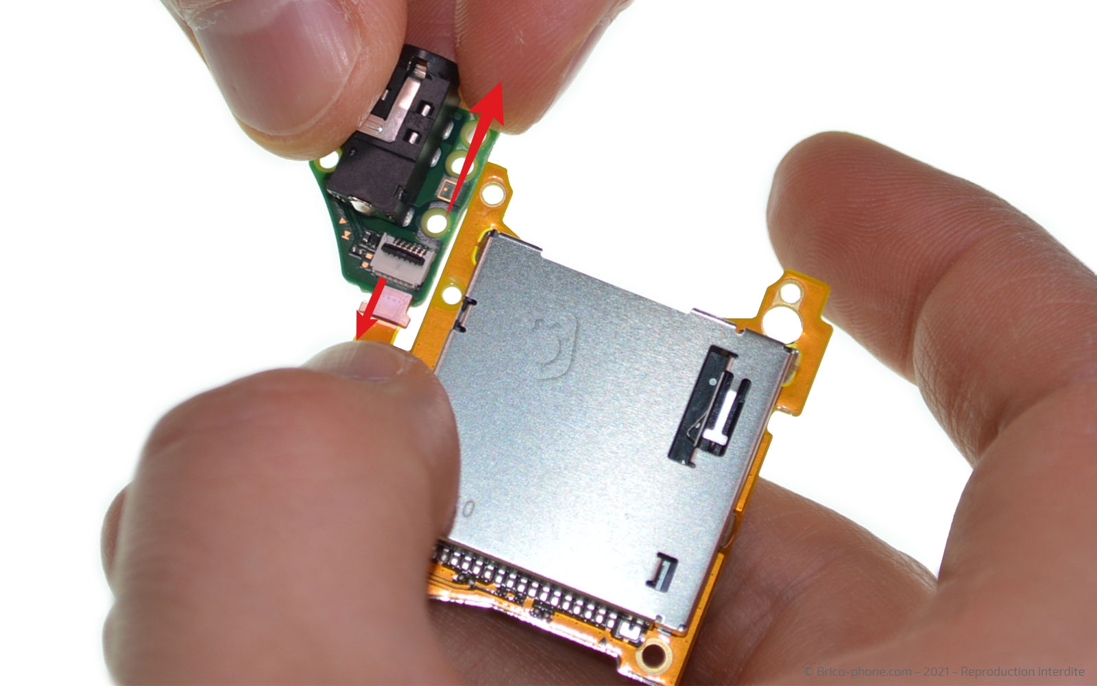 Changement du lecteur de cartes de jeux sur Switch Lite photo 2